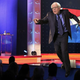 Illustration for article titled Out-Of-Control Hand Gesture Sends Bernie Sanders Tumbling Off Stage